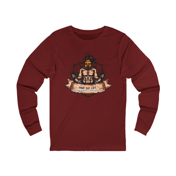 Cardinal red Christian long sleeve shirt featuring a Spartan warrior weightlifting graphic with Pray Eat Lift slogan and Kingdom Mindset Warrior Grind message.