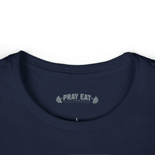 Navy blue women's Christian fitness t-shirt featuring a female weightlifter graphic with the slogan "Pray. Eat. Lift." and "Powered by Purpose."