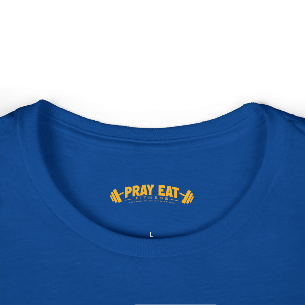 Royal blue women's Christian fitness t-shirt featuring a female weightlifter graphic with the slogan "Pray. Eat. Lift." and "Powered by Purpose."