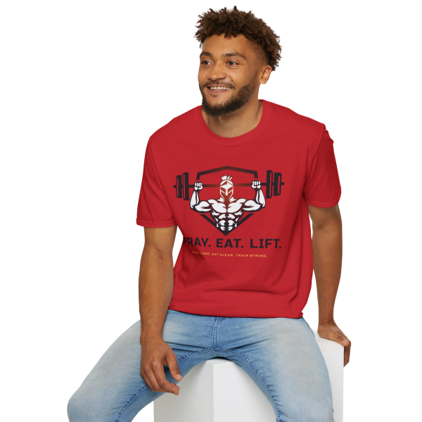 Red Christian fitness t-shirt featuring a Spartan warrior lifting a barbell with the bold Pray Eat Lift slogan for athletes, weightlifters, and gym enthusiasts.